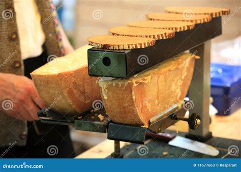 Melting cheese stock image. Image of hand, knife, food - 11677663