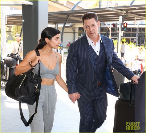 John Cena Looks Sharp In Pin Striped Suit While Arriving In Australia