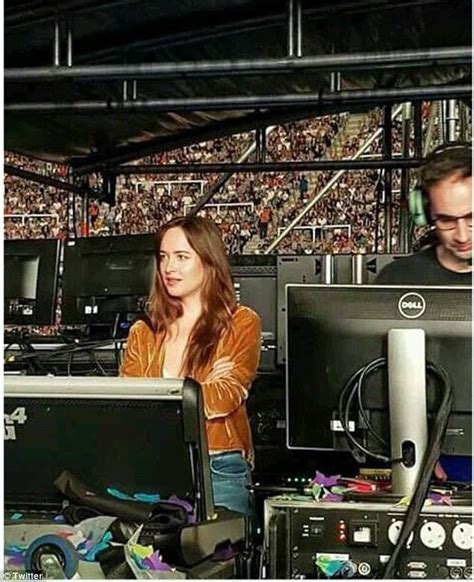 Dakota Johnson Is Spotted Watching Chris Martin Perform At Concert