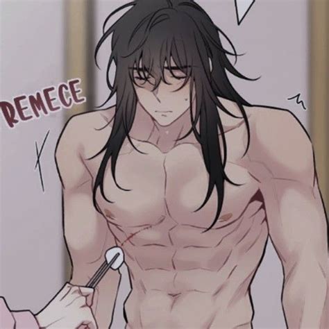 A Man With Long Black Hair And No Shirt Is Holding A Toothbrush In His Hand