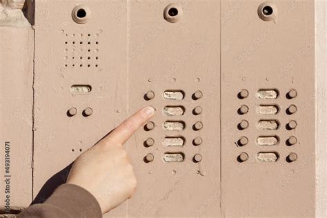 intercom doorbell on apartment building doors. Stock Photo | Adobe Stock