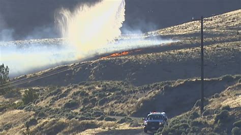 Strong winds complicate battle against multiple brush fires in Central ...