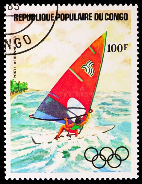 Postage Stamp Printed In Congo Shows Windsurfer Windsurfing Serie