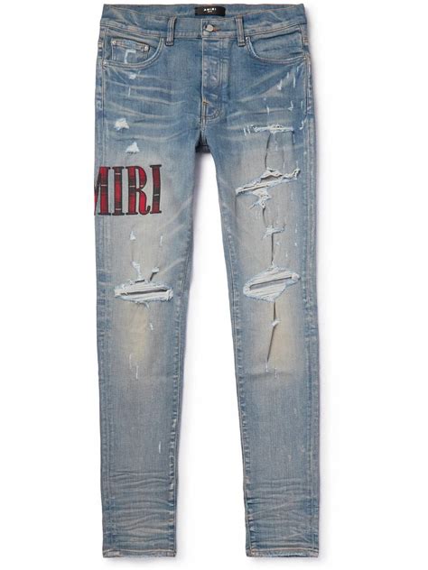 AMIRI Skinny Fit Appliquéd Distressed Jeans Blue Amiri