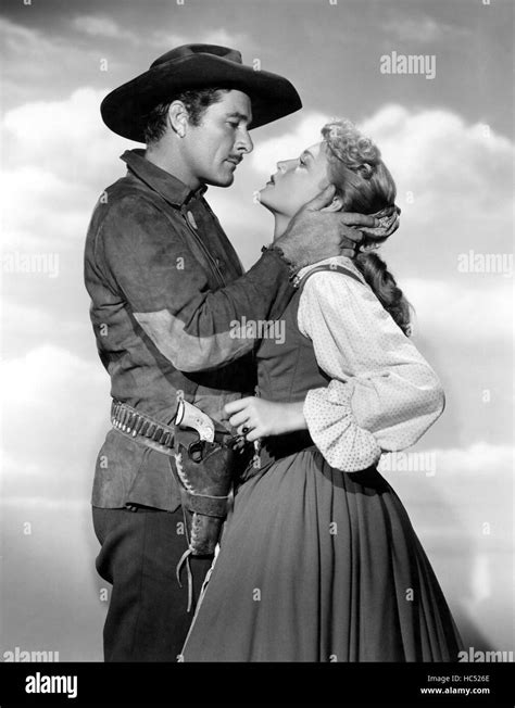 ROCKY MOUNTAIN Errol Flynn Patrice Wymore 1950 Stock Photo Alamy