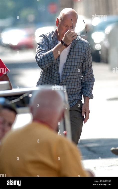 Bruce Willis puts on his sunglasses as he arrives on film set for 'A ...