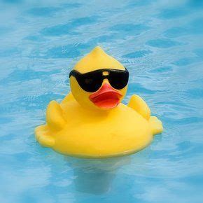 A Yellow Rubber Duck Wearing Sunglasses In The Water