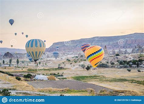 Colorful Hot Air Balloon Flying Over Cappadocia Turkey Stock Photo