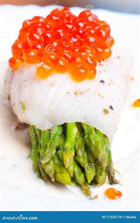 Asparagus With Fish And Red Caviar In Creamy Sauce Stock Photo Image