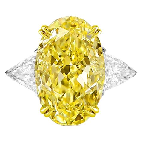 GIA Certified 4 Carat Fancy Intense Yellow Diamond Solitaire Ring For