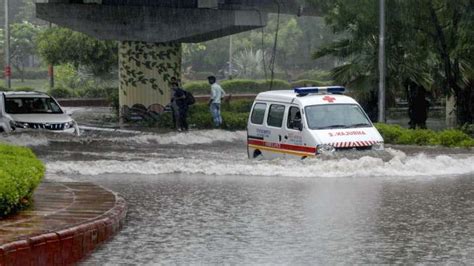 Heavy Rainfall In Delhi Ncr Leads To Waterlogged Roads Fallen Trees