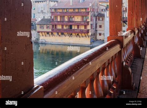 The Ponte Vecchio Or Ponte Degli Alpini Bridge And Colorful Houses