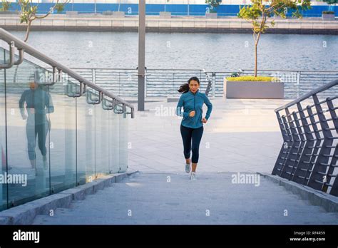 Female Running On The Stairs During An Outdoors Workout Stock Photo Alamy