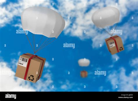 Composite Image Of D Image Of Parachute Carrying Cardboard Box Stock