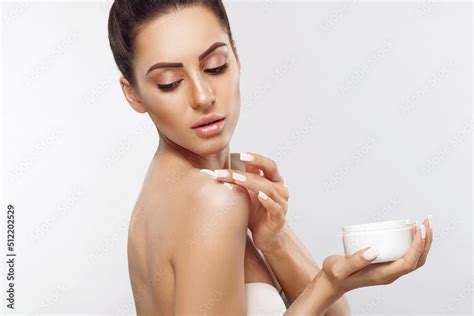 Beauty Woman Concept Skin Care Portrait Of Female Model Holding And