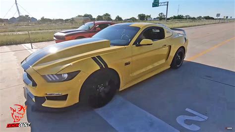 See Supercharged Roush Ford Mustang Duel Dodge Demon At Drag Strip