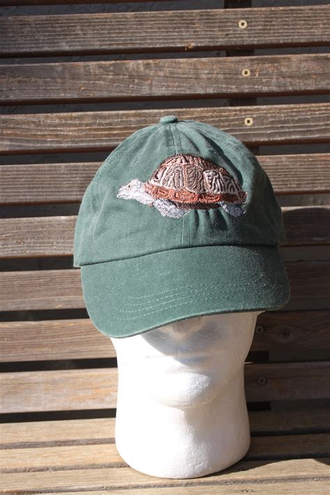 A Turtle Tortoise Is Embroidered On A Baseball Hat Cap Adjustable Hat