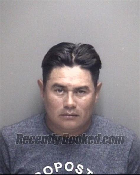 Recent Booking Mugshot For Omar Rodriguez In Galveston County Texas