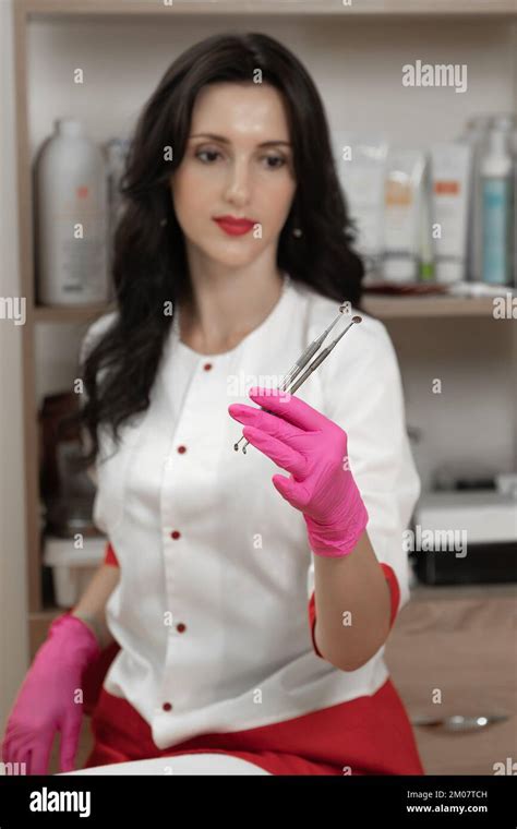 Uno Spoons In The Hands Of A Beautician Beautician Tools For Facial