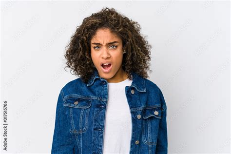 Young African American Woman Screaming Very Angry And Aggressive Stock