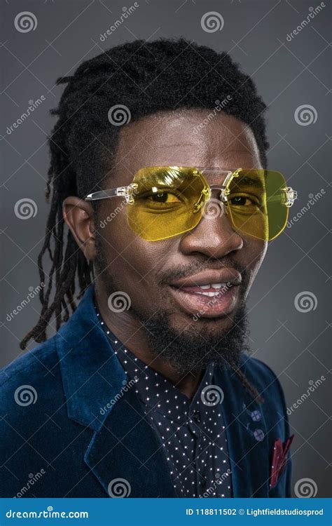 Portrait Of Handsome African American Man In Yellow Sunglasses Stock