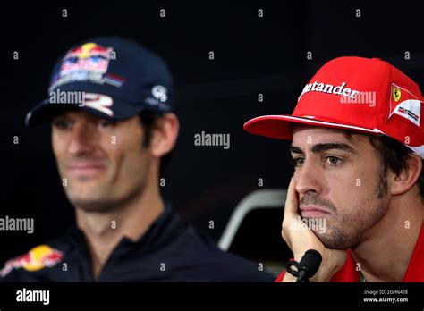 Fernando Alonso Esp Ferrari And Mark Webber Aus Red Bull Racing In