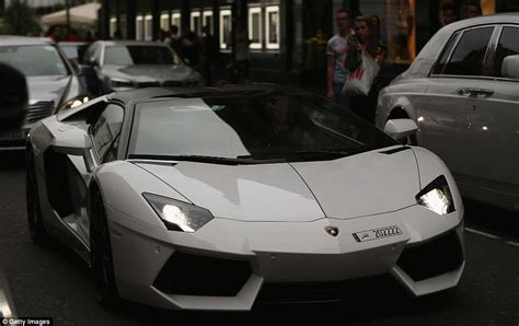 Gold Ferrari Heads Fleet Of Super Sports Cars Taking Over The Streets