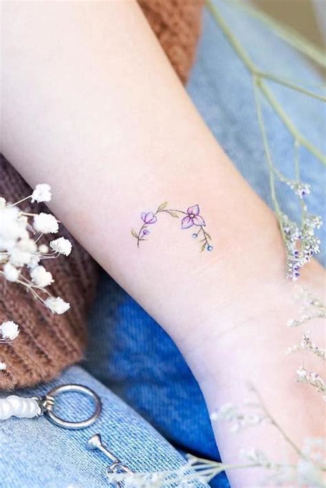 Share 74+ minimal flower tattoos latest - in.cdgdbentre