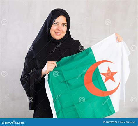 Happy Young Woman Dressed in Traditional Islamic Clothes with Algerian ...