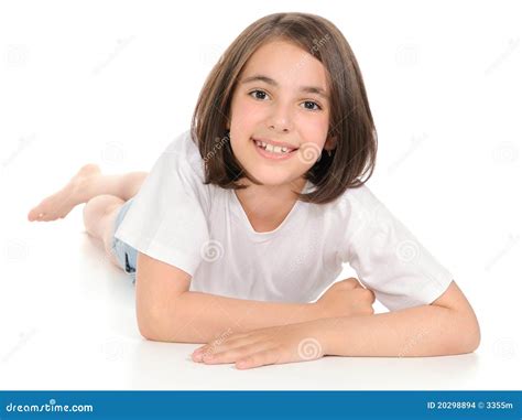 Menina Que Encontra Se Em Um Assoalho Foto De Stock Imagem De Branco