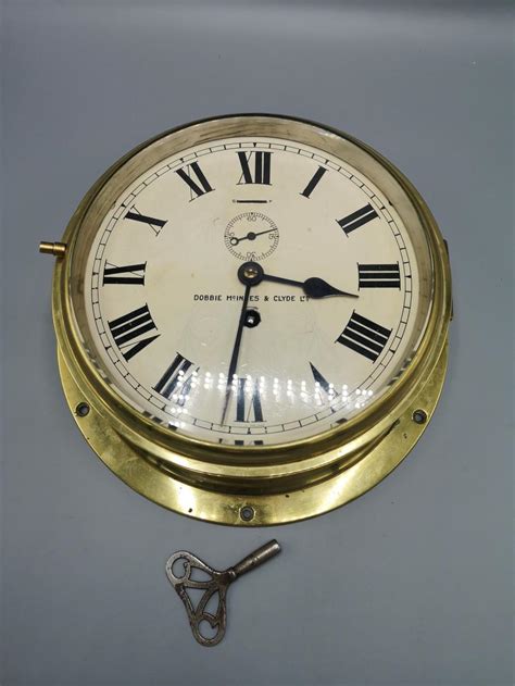 Sold Price Circa 1940 Brass Ships Bulkhead Clock Made By Dobbie Mcinnes And Clyde Suppliers To