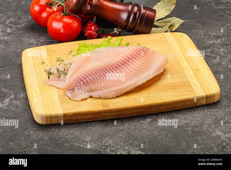 Raw Tilapia Fish Fillet For Cooking Stock Photo Alamy