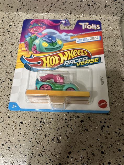 POPPY TROLLS NEW HOT WHEELS RACER VERSE Sistema de Gestión de la Calidad UNACH