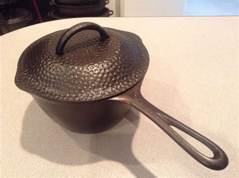 Lodge 5 Long Handle Sauce Pan Shown With Large Pattern Hammered Lid