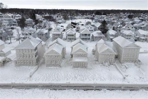 Incredible Photos Show Homes On Lake Erie Encased In Ice Following