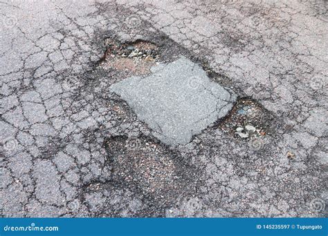 Road potholes stock image. Image of infrastructure, route - 145235597