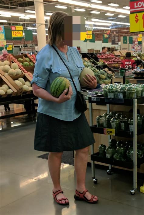 Blonde Holding Her Huge Melons Pics