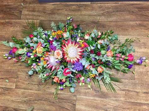 Vibrant Casket Spray Welwyn Florist