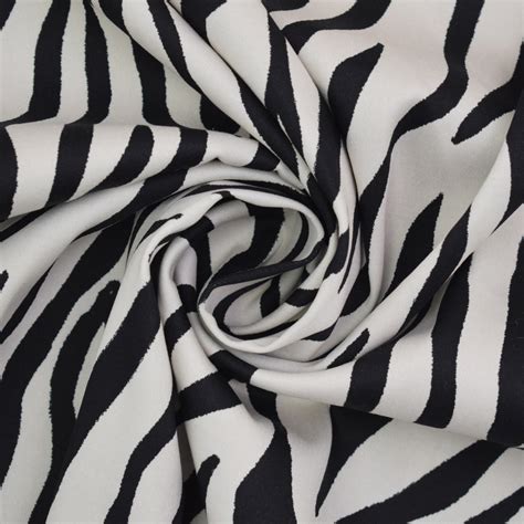 Tissu satin de coton stretch Tigre Tiger blanc cassé Tissus Hemmers