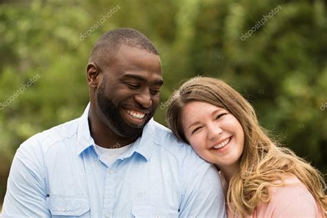 Loving Interracial Couple — Stock Photo © Pixelheadphoto 85495504