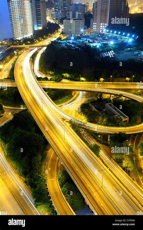 city in night with busy traffic Stock Photo - Alamy