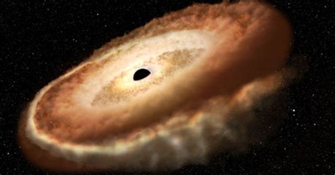 Hubble Captures Supermassive Black Hole Eating A Star Millions Of Light