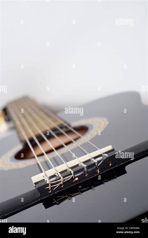 black acoustic guitar Stock Photo - Alamy