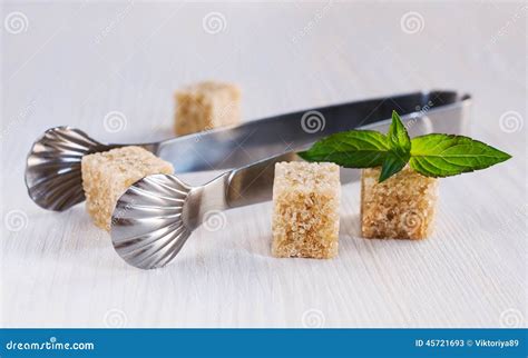 Cane Sugar Cubes With Tongs Stock Image Image Of Pieces Surface