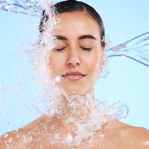 Premium Photo Water Splash Face And Skincare With A Woman In Studio