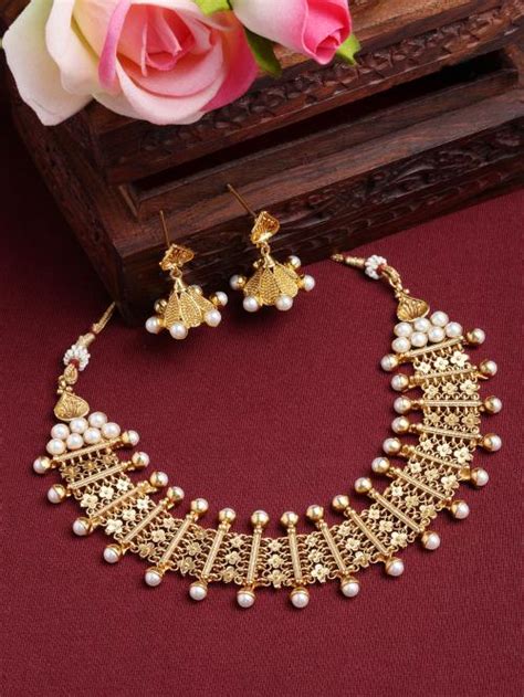 Buy Zeneme Gold Plated White Pearls Studded And Beaded Jewellery Set