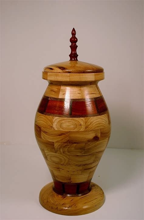 This Hand Made Segmented Urn Is Made Of Wormy Hickory Walnut Paduak It