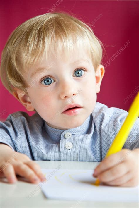 Boy drawing - Stock Image - C031/3335 - Science Photo Library