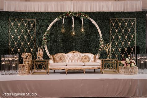 Green background for Indian wedding reception stage decoration. | Photo 271726