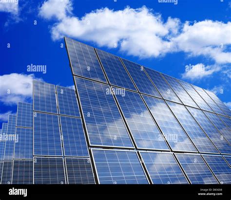 Solar Panels Under Blue Sky Stock Photo Alamy